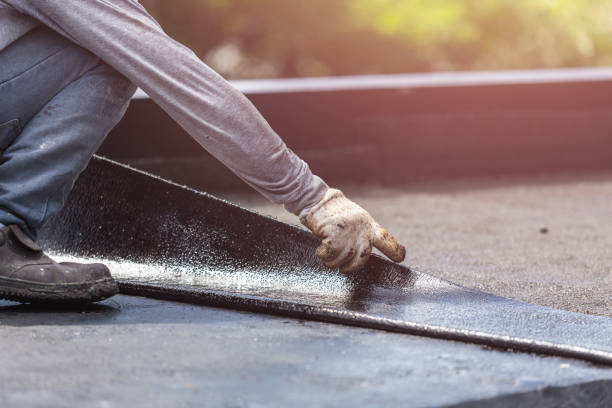 Professional Exterior Waterproofing technician working in Nashville, KS